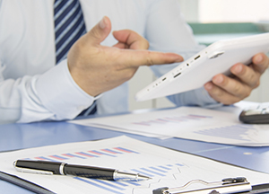 Man with Tablet and Clipboard